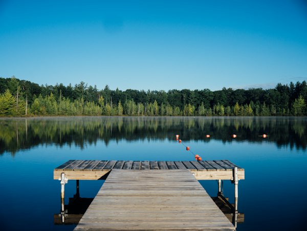 Wooden dock on calm lake